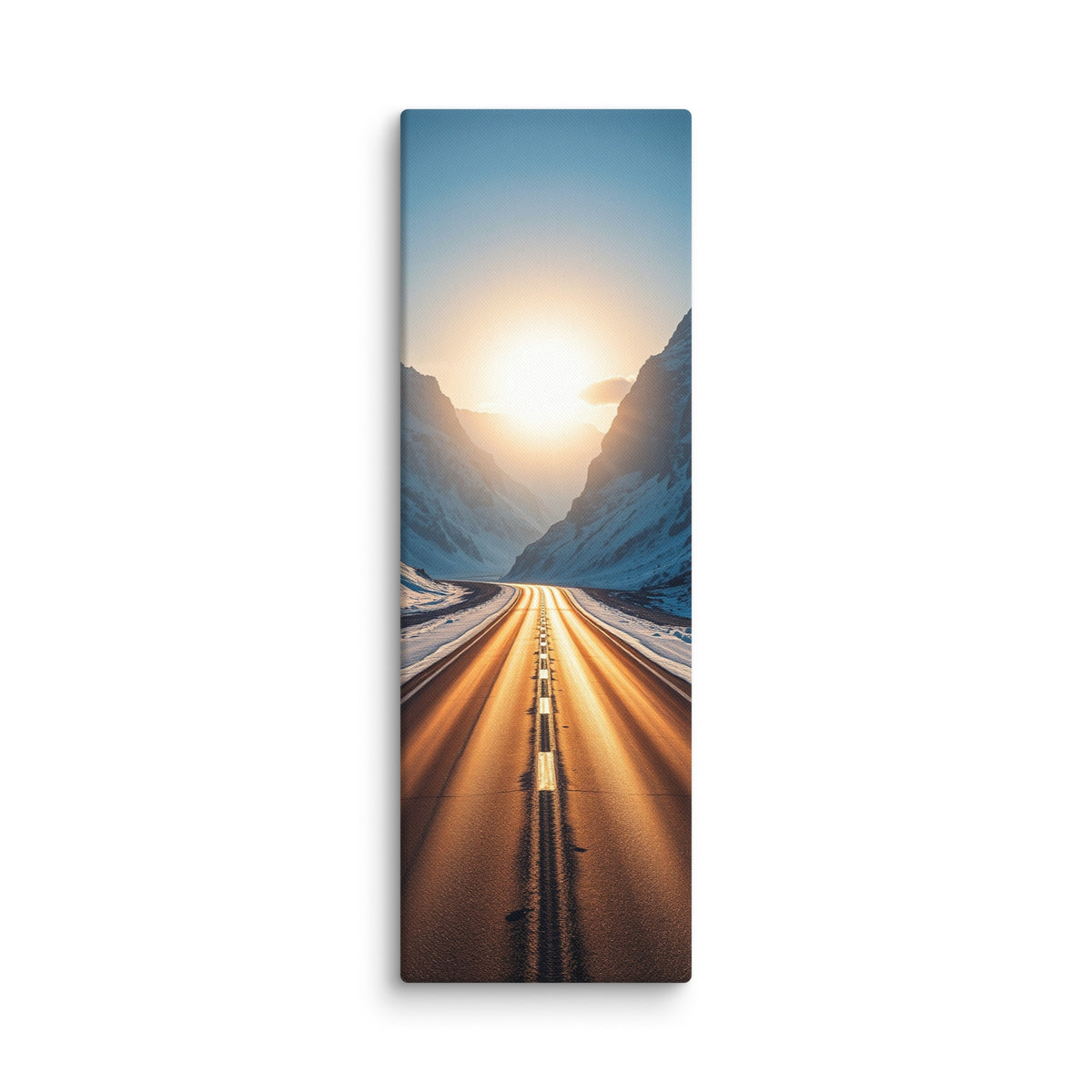 The Sun Between Walls, tall wrapped canvas print: a straight road running into a blazing sun held between two snowy mountain walls.