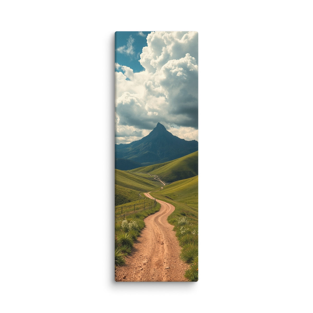 The Distant Sentinel, tall wrapped canvas print: a winding dirt road through green hills toward a sharp distant mountain peak.