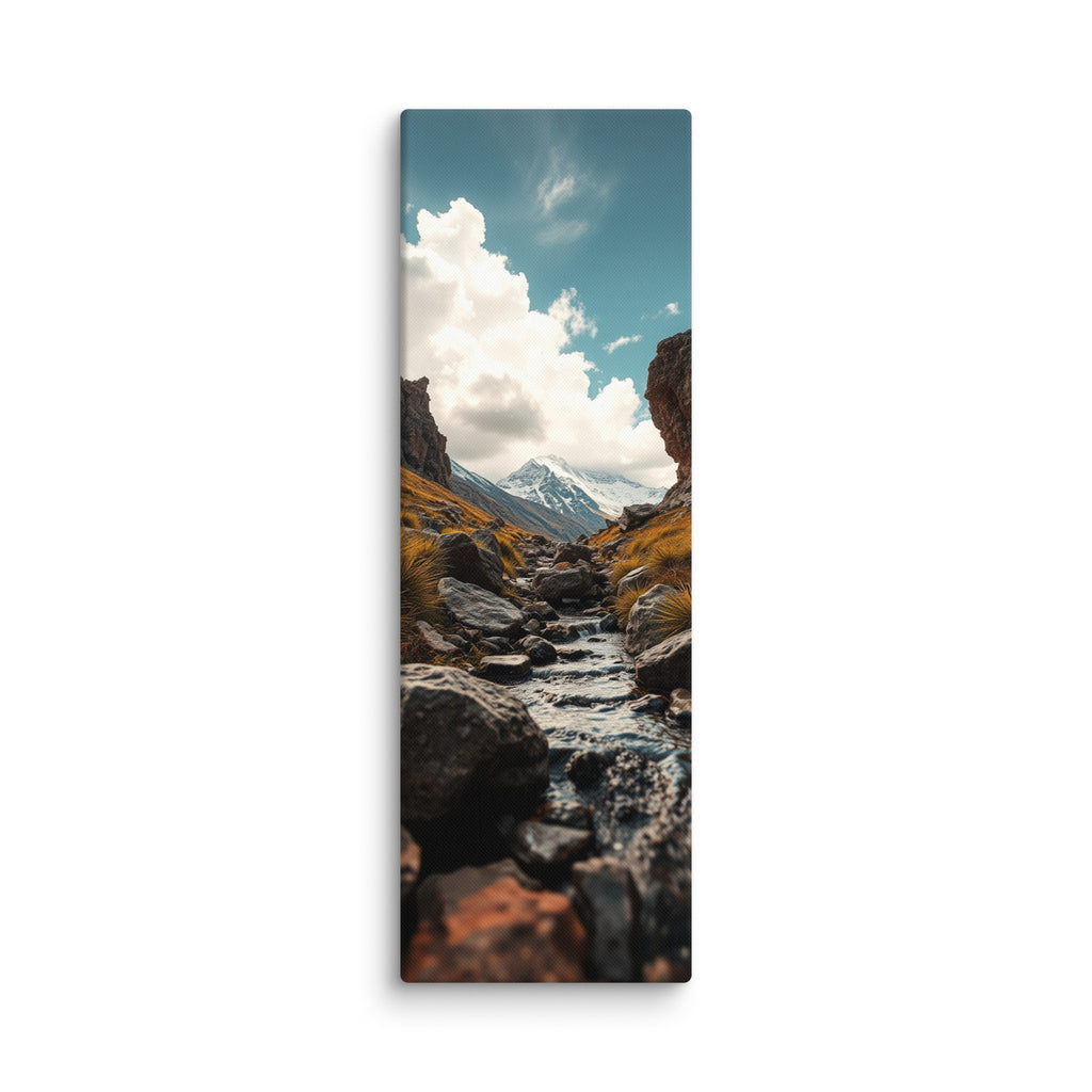 Through The Stone Gate, tall wrapped canvas print: a stream flowing between two massive rock towers toward a snow-capped mountain.