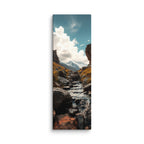 Through The Stone Gate, tall wrapped canvas print: a stream flowing between two massive rock towers toward a snow-capped mountain.