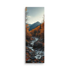 The Fallen Season, tall wrapped canvas print: fallen red and gold leaves scattered on dark rocks along an autumn mountain stream.