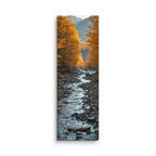 Silver Under Amber, tall wrapped canvas print: a silvery stream flowing between golden autumn trees over dark pebbles.