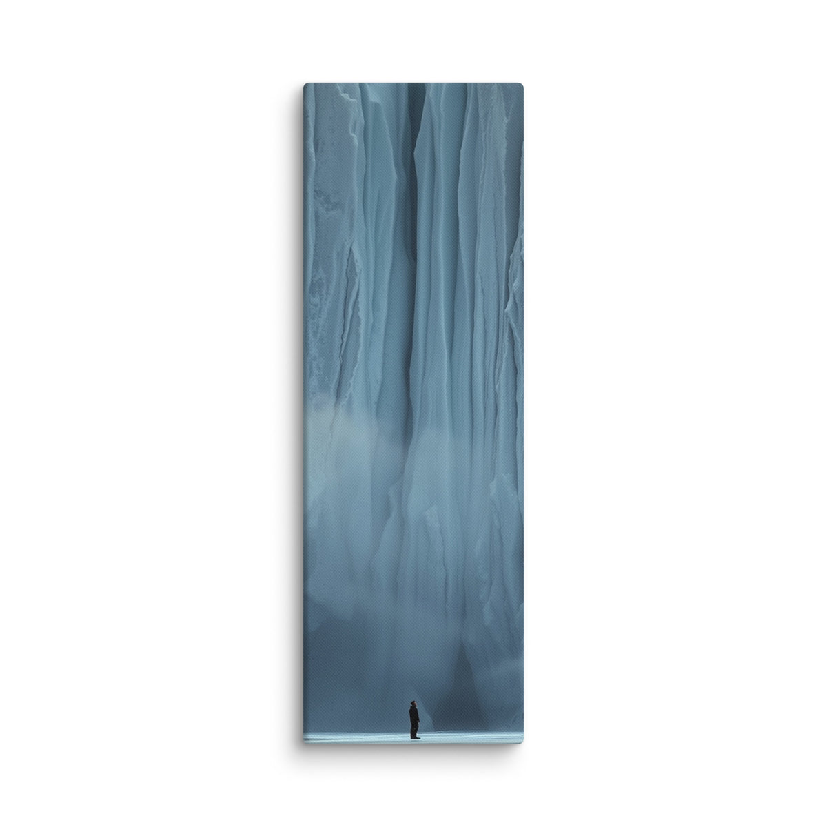 Blue Citadel, tall wrapped canvas print: a lone figure before an immense wall of pale blue ice columns rising into mist.