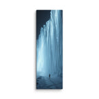 The Blue Monolith, tall wrapped canvas print: a lone figure beside a massive glowing blue-white icefall wall at night.