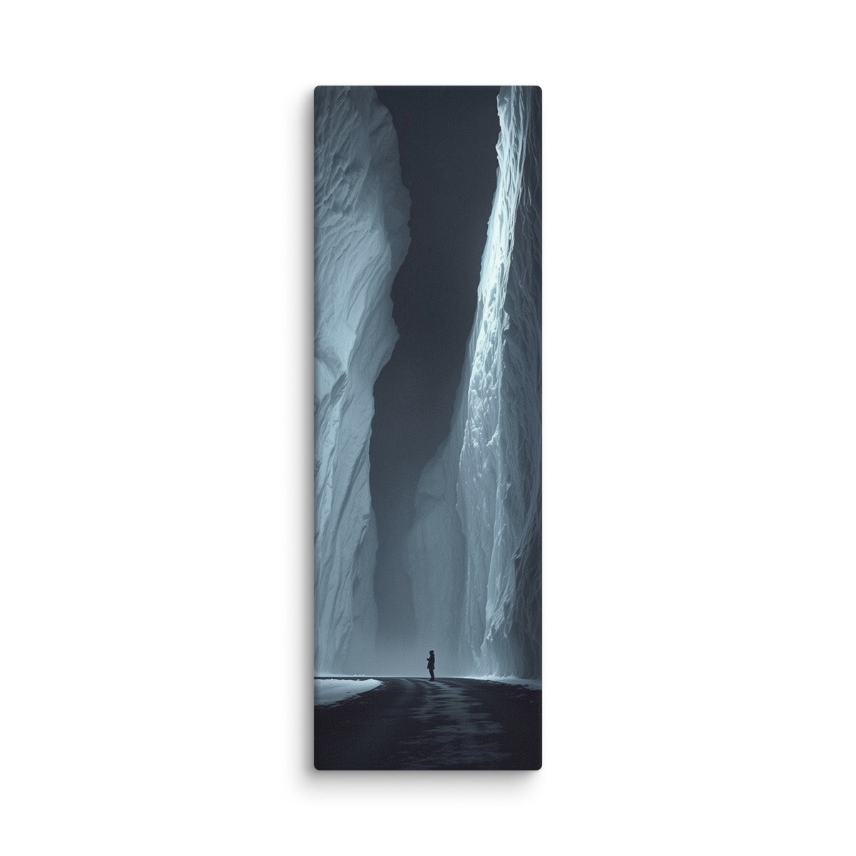 The Dark Reach, tall wrapped canvas print: a lone figure on dark ice between towering ice walls with light falling down one face.