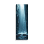 The Frozen Nave, tall wrapped canvas print: a lone figure in a blue ice canyon with mist and a shaft of light falling from above.
