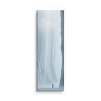 Where Forms Dissolve, tall wrapped canvas print: a lone figure in a bright white ice passage dissolving into light.