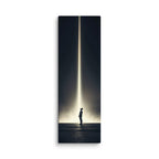 The Descending Light, tall wrapped canvas print: a lone figure looking up at a single vertical beam of golden light in darkness.